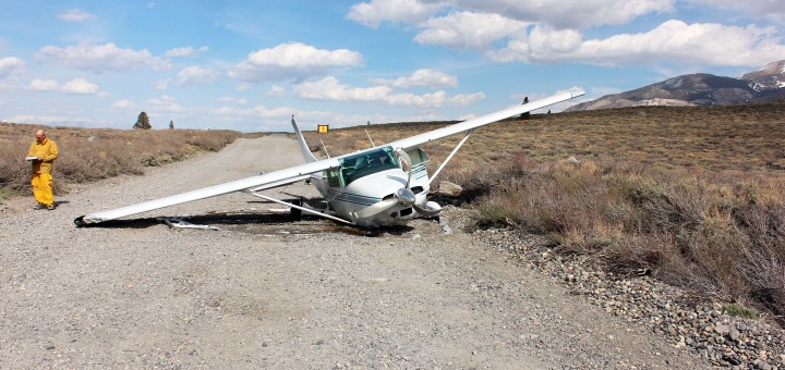 Paul and Prudence Cianci made an emergency landing in their Cessna 182 on Sherwin Creek Road on Saturday, May 24. The MLFD sandbags in the top photo prevented fuel leakage. Photo courtesy of MLFD.