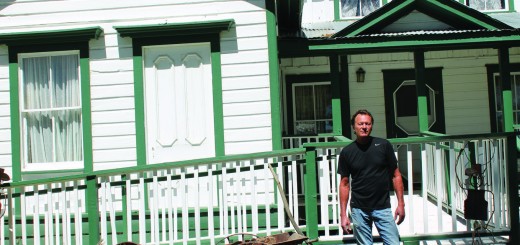 Bill Bramlette stands outside of the Old House where many of the activites during Saturday’s sesquicentennial celebration will take place. Photo courtesy: Angela Evans.