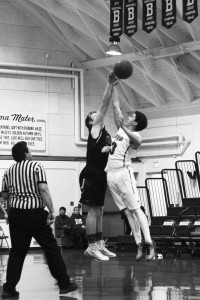iver Mallory goes up for the tip-off against Liberty. Photo courtesy: Deb Murphy.