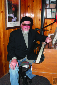 Gray at his Baby Grand. Photo courtesy: Lunch.