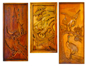 Hand-carved, varnished scrap wood crafted in the WWII relocation camps of Amache, Colorado. These relief panels were up for $600-$800 in the Rago auction. Photo courtesy: Facebook.