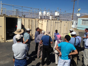Nik Barbieri explains the operation of the air district’s Owens Lake dust monitoring program to the visiting Iranian scientists. Photo courtesy: Sheet staff.