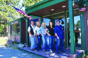 Outside the shop on Main St., from left: Toberman, Tracy, Walker, Knadler and Daniels.