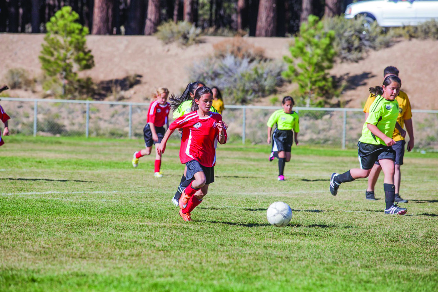 Olivia Tenedora tearing upfield for the AYSO U10 Lave Girls last weekend. Photo courtesy: Pellegrini.