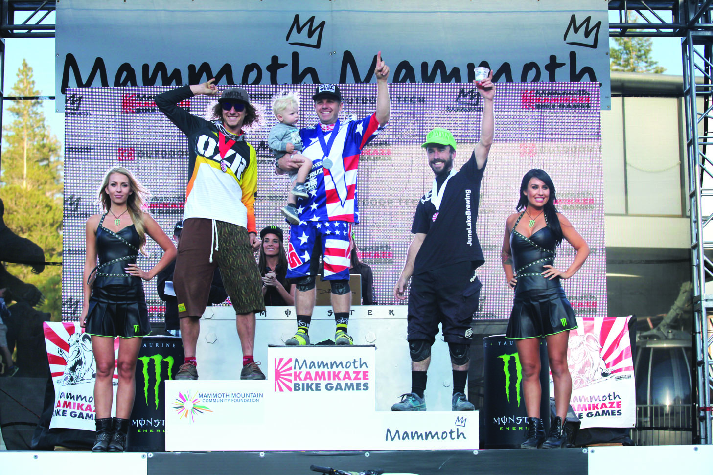 Last weekend’s podium for the Pros at the Kamikaze Bike Games had Tim Langdon first, Graeme Pitts second and Mammoth’s Jonathan Widen, hoisting one for June Lake Brewing, third. Photo courtesy: Sheet staff.
