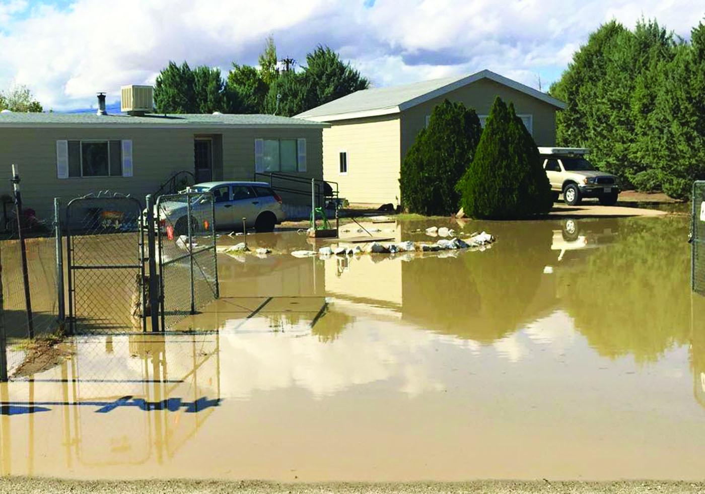 More than a dozen homes were effected by floods in Chalfant on Sunday. Photo courtesy: Mono County Sheriff's Department.