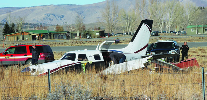 The Piper Mirage took off in a 35 mile per hour crosswind and crashed just off the runway. The San Diego passenger and pilot were not injured. Photo courtesy: Jack Lunch.