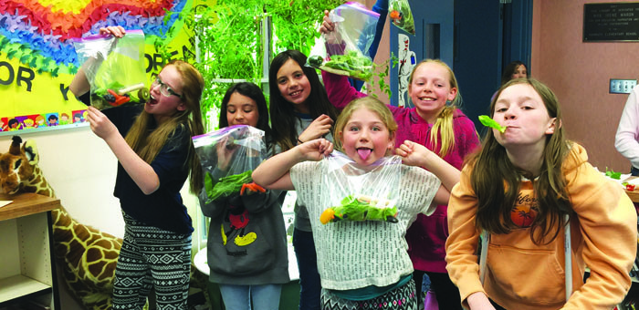 Mammoth Girl Scouts dig in. From left: Zoe Erickson, Kaeli Moore, Ciera Morrow, Winter Walker, Laurel Wight and Kat Beglau.